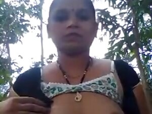 INDIAN AUNTY SHOWING BOOBS AND PUSSY IN THE JUNGLE