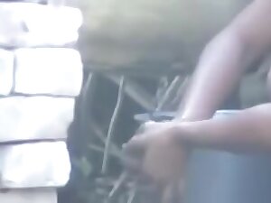 wow... outstanding desi village gal bathing outside