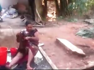 Spycam catches village aunty bathing nude outside - voyeur