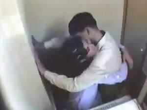 Indian girl having fun with her boyfriend in internet cafe