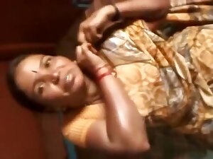 Aged Aunty showing boob