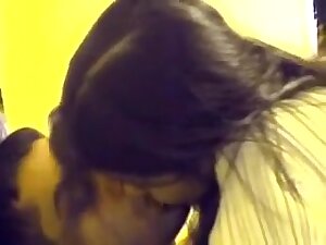 Indian immature Couple Giving A Kiss