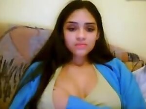 Very hot girl teasing and strpping on cam