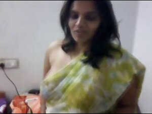 Indian mother I'd like to fuck does a little disrobe tease with saree