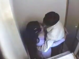 Indian girl having fun with her boyfriend in internet cafe