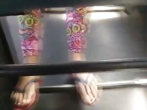 Teen girl feet on public bus