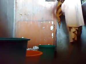 Bangladeshi Maid taking shower.