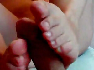 My wife in a handjob and foot action
