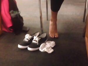 Candid sexy indian feet socks off at library