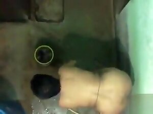 Spying on a desi woman washing her clothes naked